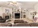 Cozy living room featuring a stone fireplace and recessed lighting at 38301 N 15Th Ave, Phoenix, AZ 85086