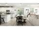 Bright dining area seamlessly connected to the kitchen and living room at 4110 S 58Th Ln, Phoenix, AZ 85043