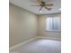 Bedroom featuring plush carpet and window with a view of the exterior at 4417 W Lawler Loop, Phoenix, AZ 85083