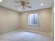 Bedroom featuring plush carpet and window with a view of the exterior at 4417 W Lawler Loop, Phoenix, AZ 85083