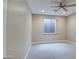 Bedroom featuring plush carpet and window with a view of the exterior at 4417 W Lawler Loop, Phoenix, AZ 85083