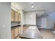 Kitchen showcasing granite countertops, light wood cabinetry, and stainless steel sink at 4417 W Lawler Loop, Phoenix, AZ 85083