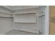 Spacious walk-in closet with white shelving and ample storage space at 4417 W Lawler Loop, Phoenix, AZ 85083