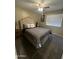 Comfortable bedroom features neutral tones, carpet, and ceiling fan at 4546 N 84Th Ln, Phoenix, AZ 85037