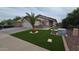 Charming single-story home featuring a well-manicured front yard, desert landscaping, and a two car garage at 4546 N 84Th Ln, Phoenix, AZ 85037