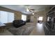 Bright living room with tile floors, dual ceiling fans, and neutral paint colors for a relaxing atmosphere at 4546 N 84Th Ln, Phoenix, AZ 85037