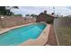 Sparkling swimming pool, perfect for cooling off on a hot day, surrounded by a private backyard at 4546 N 84Th Ln, Phoenix, AZ 85037