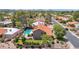 Beautiful aerial view of a home highlighting the pool, backyard, and surrounding neighborhood at 5045 E Redfield Rd, Scottsdale, AZ 85254