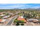 Scenic aerial view of a neighborhood with tree-lined streets and mountain backdrop at 5045 E Redfield Rd, Scottsdale, AZ 85254