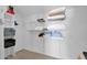 Well-organized walk-in closet with shelving for linens and personal items at 5045 E Redfield Rd, Scottsdale, AZ 85254