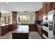 Bright kitchen with stainless steel appliances and a window that views the outdoor scenery at 5045 E Redfield Rd, Scottsdale, AZ 85254