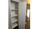 A closet with adjustable shelving that provides ample storage solutions and organization at 7126 N 19Th Ave # 103, Phoenix, AZ 85021