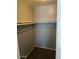 Walk-in closet with single rack for hanging clothing at 7126 N 19Th Ave # 103, Phoenix, AZ 85021