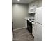 Updated kitchen with white appliances, cabinets and modern countertops at 7126 N 19Th Ave # 103, Phoenix, AZ 85021