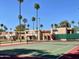 Enjoy a game of tennis on the community court with well-maintained landscaping at 7126 N 19Th Ave # 103, Phoenix, AZ 85021