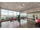 Bright fitness center featuring floor-to-ceiling windows with scenic views at 7180 E Kierland Blvd # 312, Scottsdale, AZ 85254