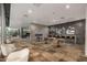 Modern lounge area with a coffee bar, tables, and comfortable seating at 7180 E Kierland Blvd # 312, Scottsdale, AZ 85254