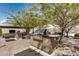 Modern outdoor kitchen area with grilling stations and seating, ideal for hosting gatherings and enjoying the outdoors at 7180 E Kierland Blvd # 312, Scottsdale, AZ 85254