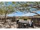 Inviting outdoor seating area, featuring shade trees, a grill, and scenic views for entertaining at 7180 E Kierland Blvd # 312, Scottsdale, AZ 85254