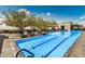 Bright community pool with lounge chairs, offering a serene space for relaxation and recreation at 7180 E Kierland Blvd # 312, Scottsdale, AZ 85254