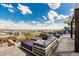 Relax and unwind on the rooftop deck, featuring comfortable seating, stunning city views, and a cozy fire pit at 7180 E Kierland Blvd # 312, Scottsdale, AZ 85254