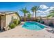 Backyard pool with desert landscaping and mature trees at 725 E Country Gables Dr, Phoenix, AZ 85022