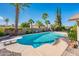 Backyard pool with desert landscaping and diving board at 725 E Country Gables Dr, Phoenix, AZ 85022