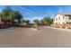 Paver street leading to charming homes in a well-maintained community with lush landscaping at 7252 N 90Th Ln, Glendale, AZ 85305