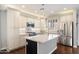 Beautiful kitchen with white cabinetry, granite countertops, stainless steel appliances, and center island at 7428 W Montgomery Rd, Peoria, AZ 85383