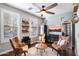 Stylish sitting room offering three chairs, a round table, and elegant furnishings to gather and relax at 7428 W Montgomery Rd, Peoria, AZ 85383