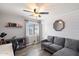 Cozy living room with hardwood floors, and modern decor, creating an inviting space at 7428 W Montgomery Rd, Peoria, AZ 85383