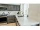 Clean, modern kitchen counter with stainless sink, gold faucet, and plenty of counter space at 7543 E Keats Ave, Mesa, AZ 85209