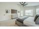 Spacious main bedroom with ceiling fan and neutral color palette at 7543 E Keats Ave, Mesa, AZ 85209