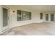 Covered patio with ceiling fan, perfect for outdoor relaxation and entertaining guests at 7543 E Keats Ave, Mesa, AZ 85209