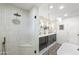 Bright bathroom showcasing double sink vanity, glass shower, and free-standing tub, exuding a spa-like ambiance at 8405 N Via Mia --, Scottsdale, AZ 85258