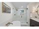 Bathroom featuring glass shower, soaking tub, and elegant fixtures at 8405 N Via Mia --, Scottsdale, AZ 85258