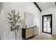 Chic entryway featuring a stylish cabinet, art, and a view of the front yard, creating a welcoming entrance at 8405 N Via Mia --, Scottsdale, AZ 85258