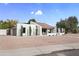 Contemporary home with a red tile roof, desert landscaping, and attached garage at 8405 N Via Mia --, Scottsdale, AZ 85258