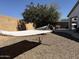 Relaxing backyard featuring a hammock and desert landscaping under a clear blue sky at 872 W Desert Sky Dr, San Tan Valley, AZ 85143