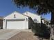 Charming one-story home featuring a two car garage, landscaped front yard, and neutral color palette at 872 W Desert Sky Dr, San Tan Valley, AZ 85143