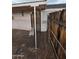 A backyard features a wooden fence, covered patio, and an access gate at 8727 N 35Th Dr, Phoenix, AZ 85051