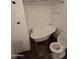 Bathroom featuring an antique claw foot tub and standard toilet at 8727 N 35Th Dr, Phoenix, AZ 85051