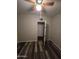 Bedroom featuring wood-look floors, ceiling fan, and neutral paint at 8727 N 35Th Dr, Phoenix, AZ 85051