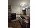 Kitchen featuring stainless steel appliances, white cabinetry, and under cabinet lighting at 8727 N 35Th Dr, Phoenix, AZ 85051