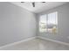 Bright and airy bedroom featuring tile floors, a ceiling fan, and a window with natural light streaming in at 8836 S 165Th Ave, Goodyear, AZ 85338