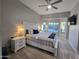 Comfortable bedroom with large bed and pool views through bright windows at 8965 E Red Mountain Ln, Gold Canyon, AZ 85118