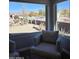 Cozy seating area with mountain views through large picture windows at 8965 E Red Mountain Ln, Gold Canyon, AZ 85118