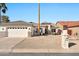 Charming single-story home with desert landscaping and a two-car garage in a sunny locale at 9138 E Emerald Dr, Sun Lakes, AZ 85248