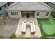 A beautiful outdoor kitchen and patio are visible from an aerial view at 9302 W White Feather Ln, Peoria, AZ 85383