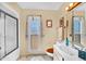 Bathroom with a shower over tub and tiled floor at 9813 W Sandstone Dr, Sun City, AZ 85351